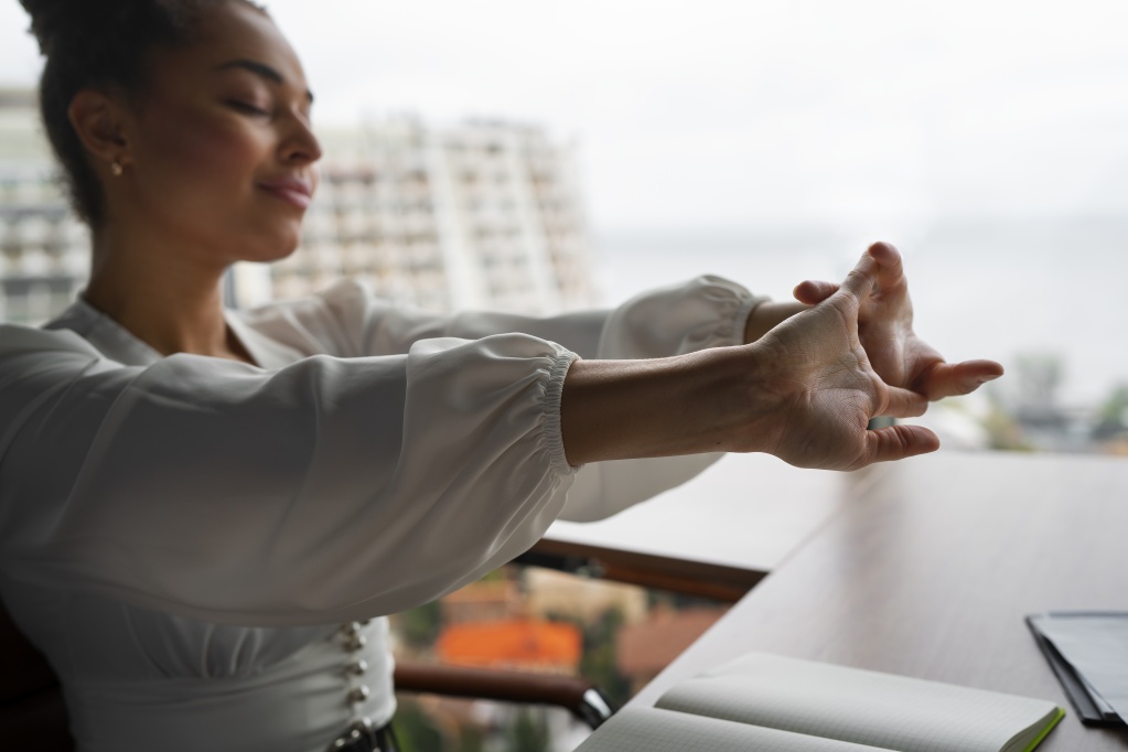 medium-shot-woman-stretching-work.jpg