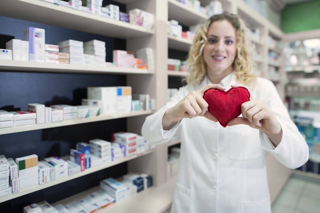 female-pharmacist-holding-heart-and-promoting-cardiovascular-medications-and-successful-treatment.jpg