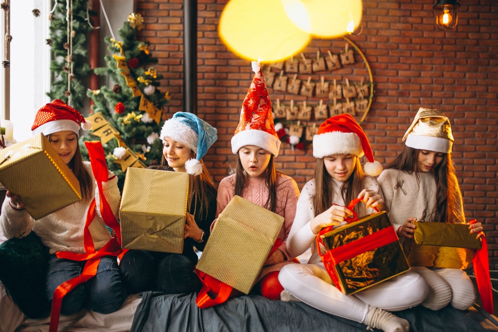 group-of-kids-sitting-sitting-with-presents.jpg