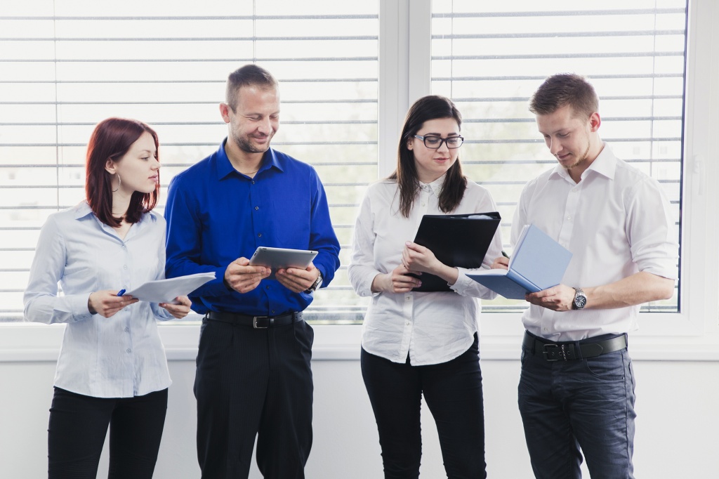 team-with-notebooks-tablet.jpg